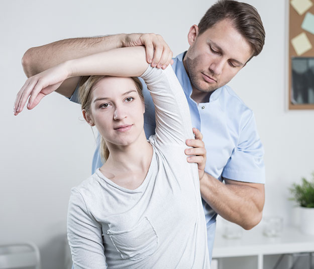 Women having a chiropractic adjustment